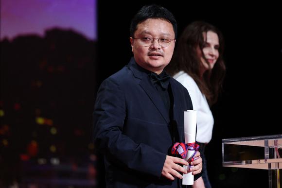 Bi Gan receives the Special Jury Prize in Cannes (Alpes-Maritimes) on May 24, 2025.