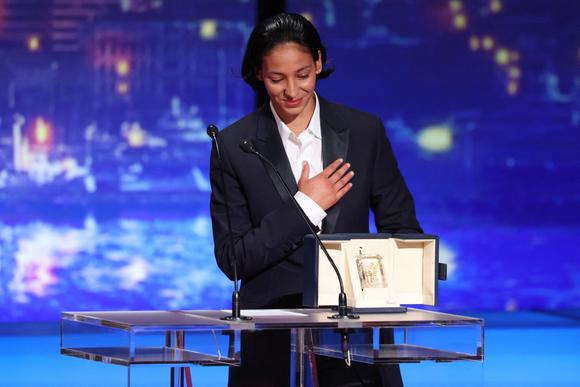 Actress Nadia Melliti receives the Best Actress Award for 