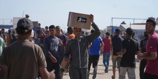In Gaza, Israel's new food distribution system turns to chaos