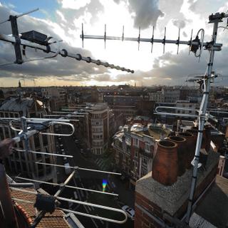 The roofs of Lille, northern France, bear television aerials on january 27, 2012. AFP PHOTO PHILIPPE HUGUEN (Photo by PHILIPPE HUGUEN / AFP)
