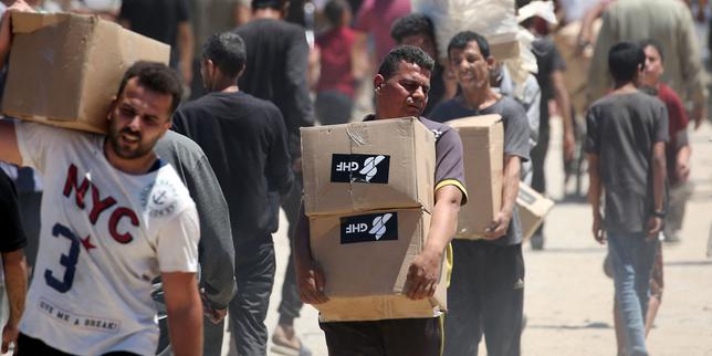 Gaza aid sites suspend operations as Israel declares access routes 'combat zones'