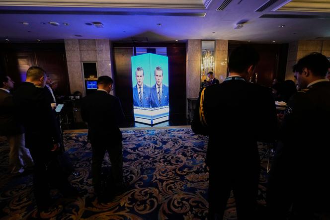 Des participants au Shangri-La Dialogue, forum sur la sécurité et la défense, suivent le discours du secrétaire à la défense américain, Pete Hegseth, à Singapour, samedi 31 mai 2025.