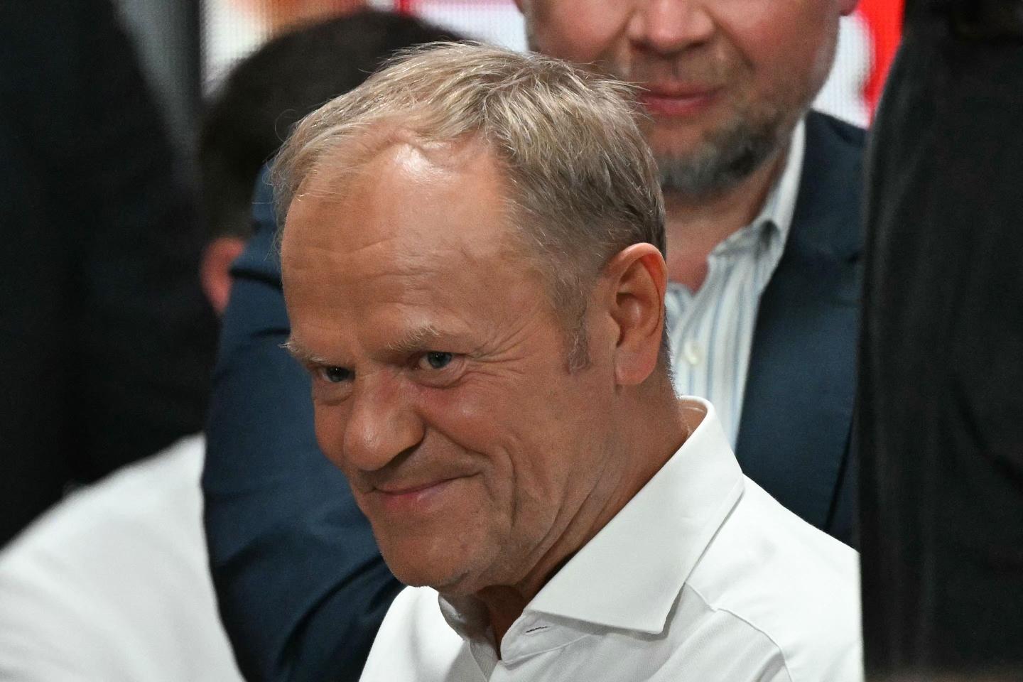 Polish PM calls for a parliamentary confidence vote after nationalist wins presidency