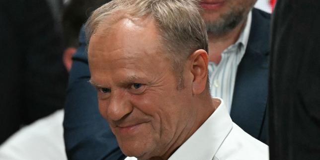 Polish PM calls for a parliamentary confidence vote after nationalist wins presidency