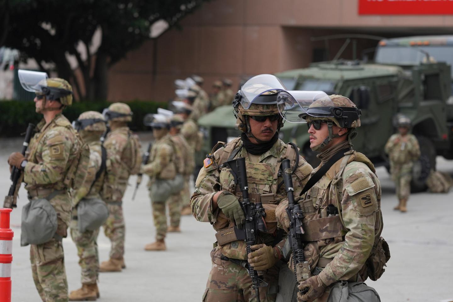 National Guard troops deployed by Trump arrive in Los Angeles amid protests over immigration raids