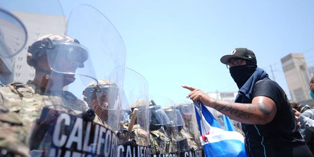 Los Angeles sees another tense day of protests under surveillance of National Guard