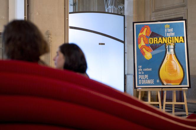 Publicité pour Orangina, dans le cadre d’une exposition rendant hommage au créateur de la boisson, Jean-Claude Beton, à Marseille, le 30 juin 2011.
