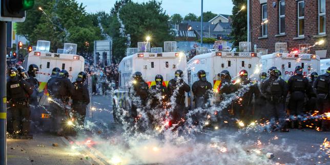 Tense standoff as a town in Northern Ireland braces for a third night of riots