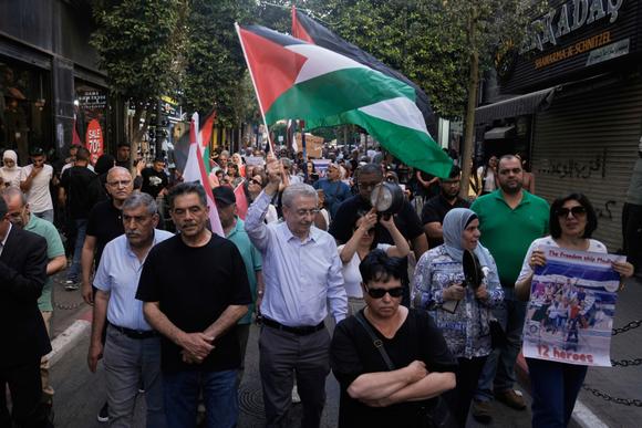 Lors d’une marche en soutien aux Palestiniens de la bande de Gaza, à Ramallah, le 12 juin 2025.