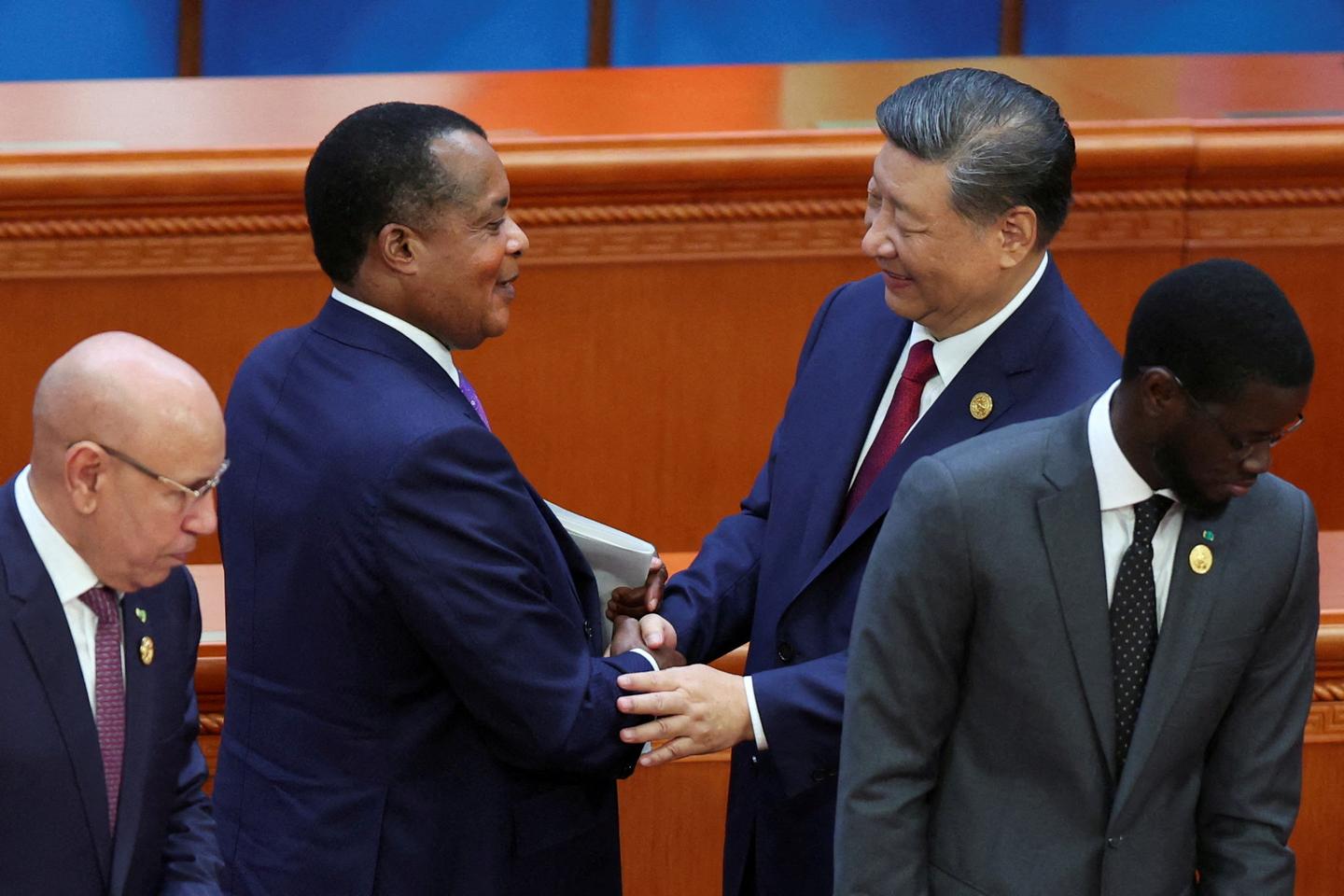 'To those rejected by the US, China opens its arms wider'