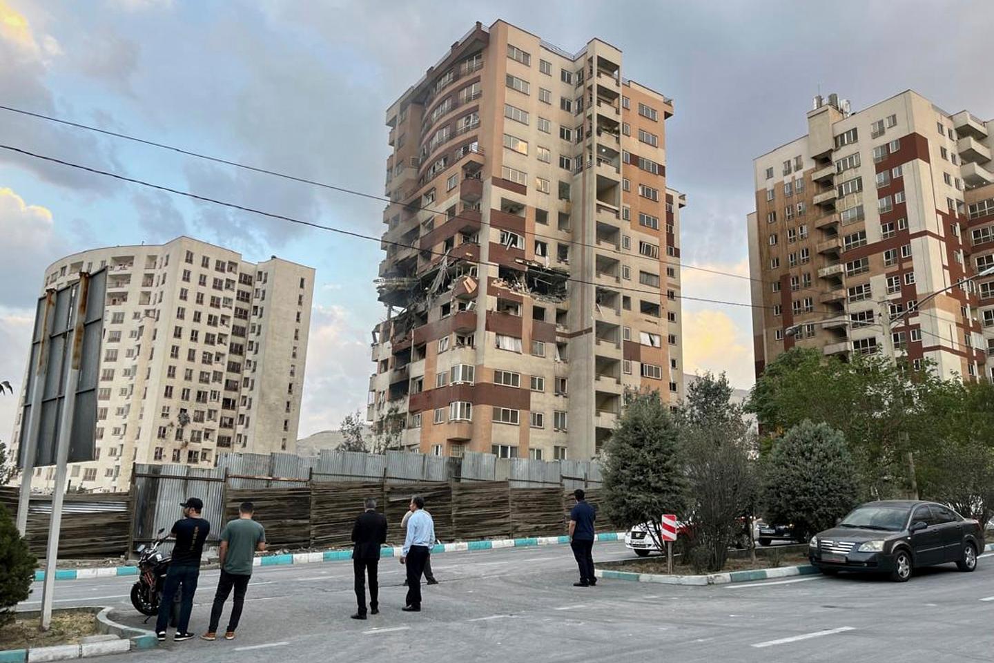As Israel strikes Iran, US pointedly steps back to protect its forces in Middle East