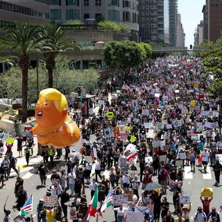 People attend the No Kings protest against U.S. President Donald Trump's policies, in Los Angeles, California, U.S., June 14, 2025.  REUTERS/Aude Guerrucci     TPX IMAGES OF THE DAY