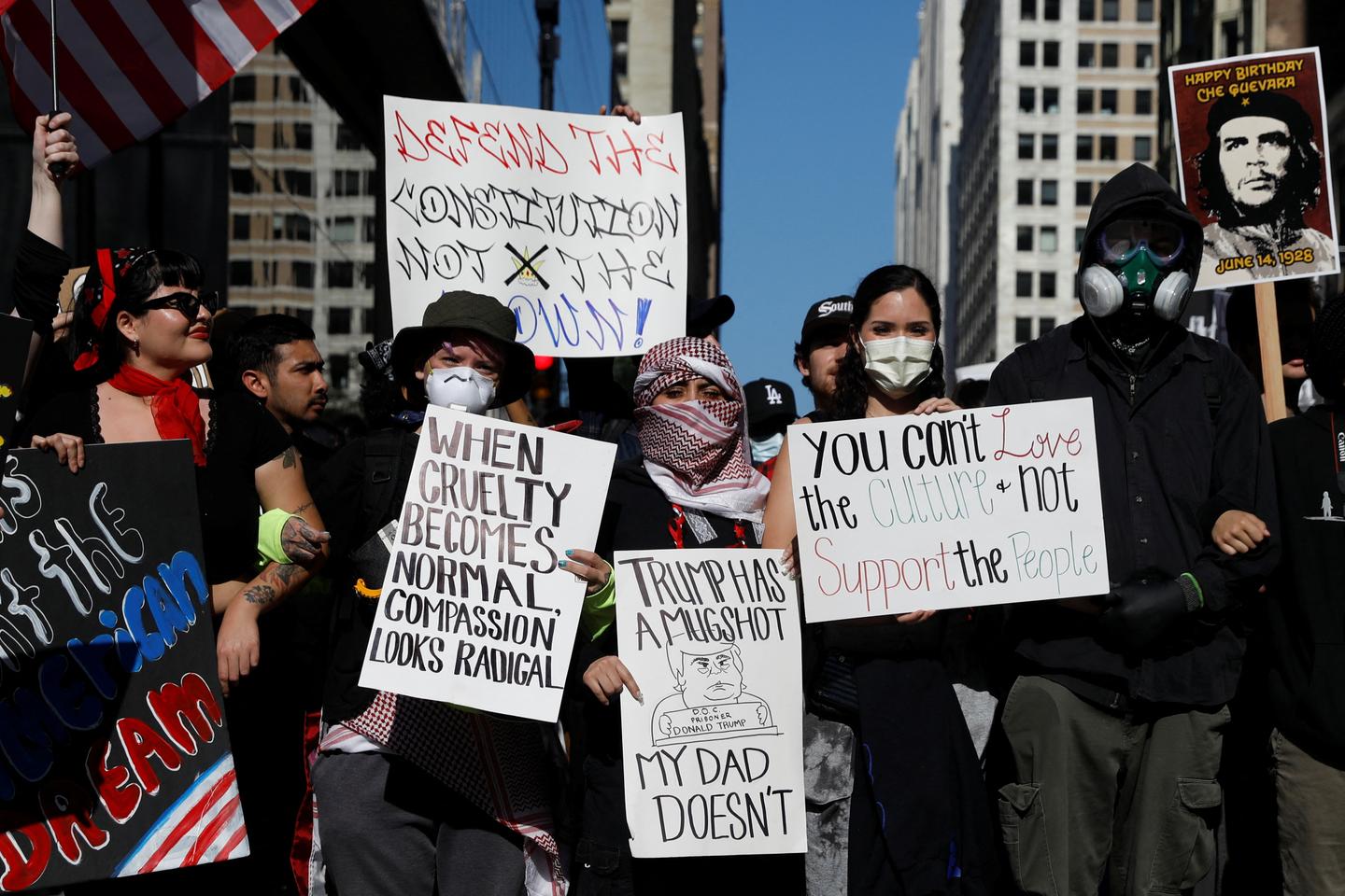 Anti-Trump protesters rally across US on same day as military parade