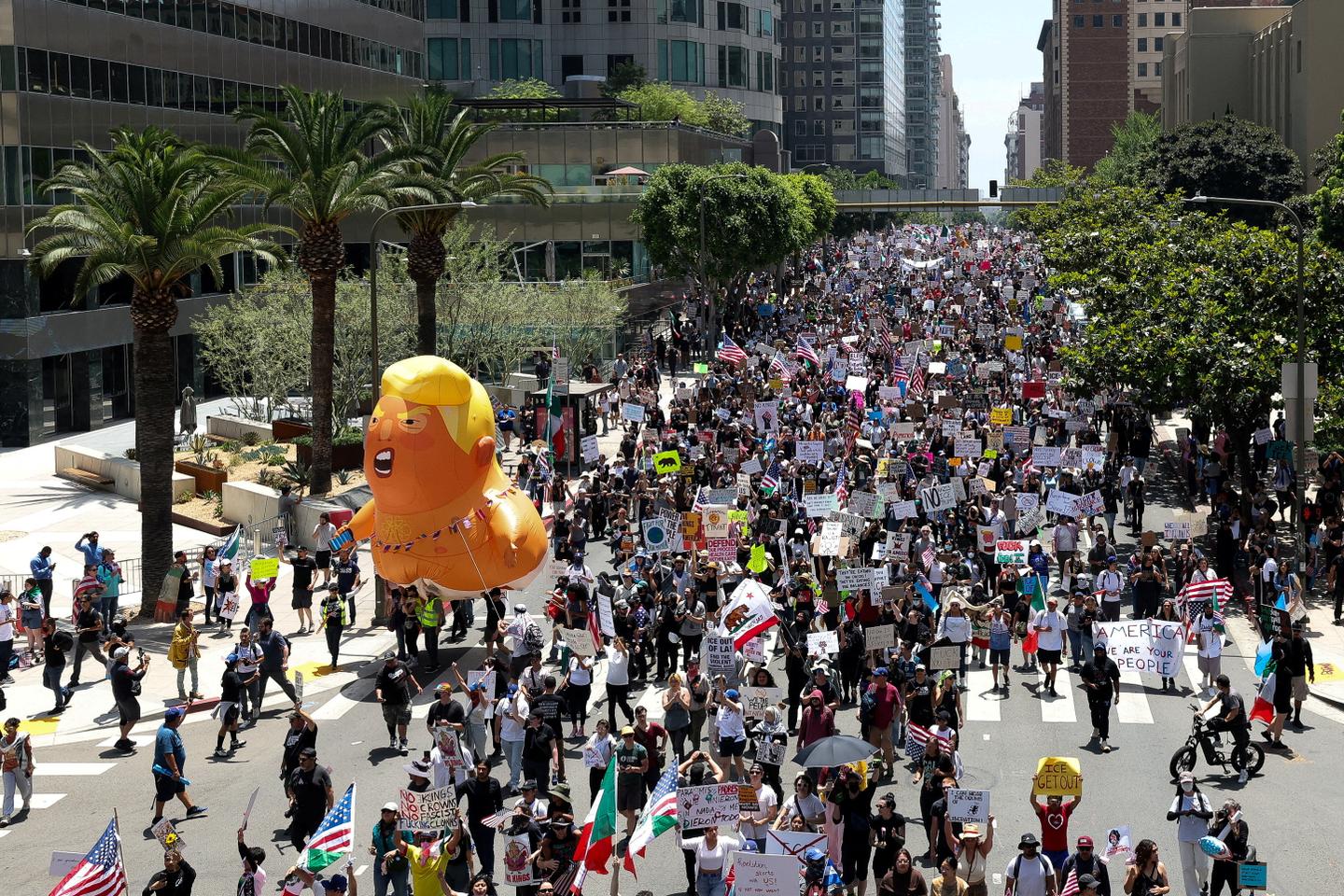 Large crowds gather across the US against Trump, in both joyful and anxious atmosphere: 'We needed to know there were others like us'
