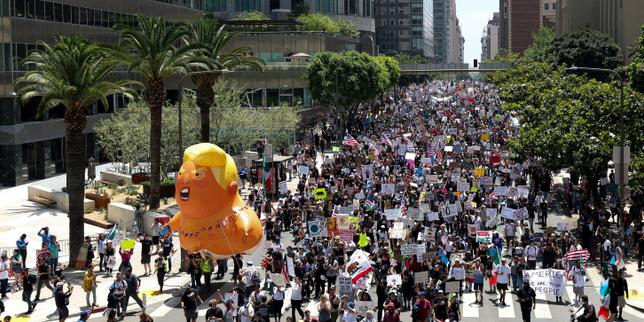 Large crowds gather across the US against Trump, in both joyful and anxious atmosphere: 'We needed to know there were others like us'