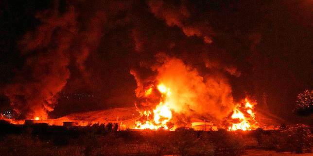 Israeli military says it hit Iran's defense ministry HQ and nuclear weapons-linked sites