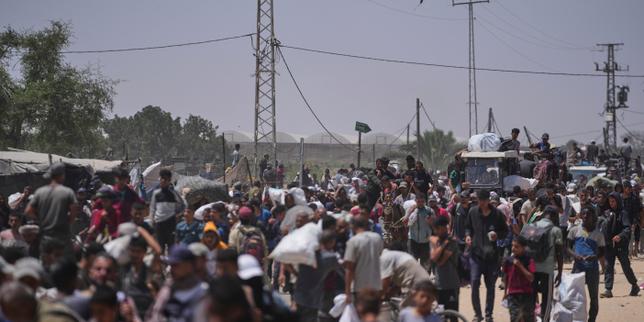 Gaza rescuers say Israeli fire kills at least 20 queuing for food