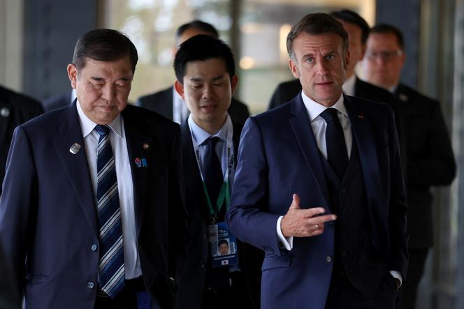 Emmanuel Macron e o primeiro -ministro japonês Shigeru Ishiba, no cume dos gerentes do Seven Group (G7) em Kananaskis (Alberta), no Canadá, em 17 de junho de 2025.