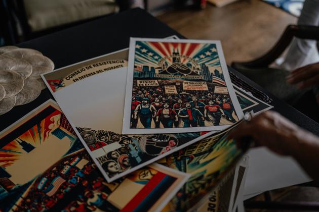 Posters with messages in support of immigrants, created by Dulce Maria Garduno, a graphic designer, in Chicago, Illinois, on June 19, 2025.