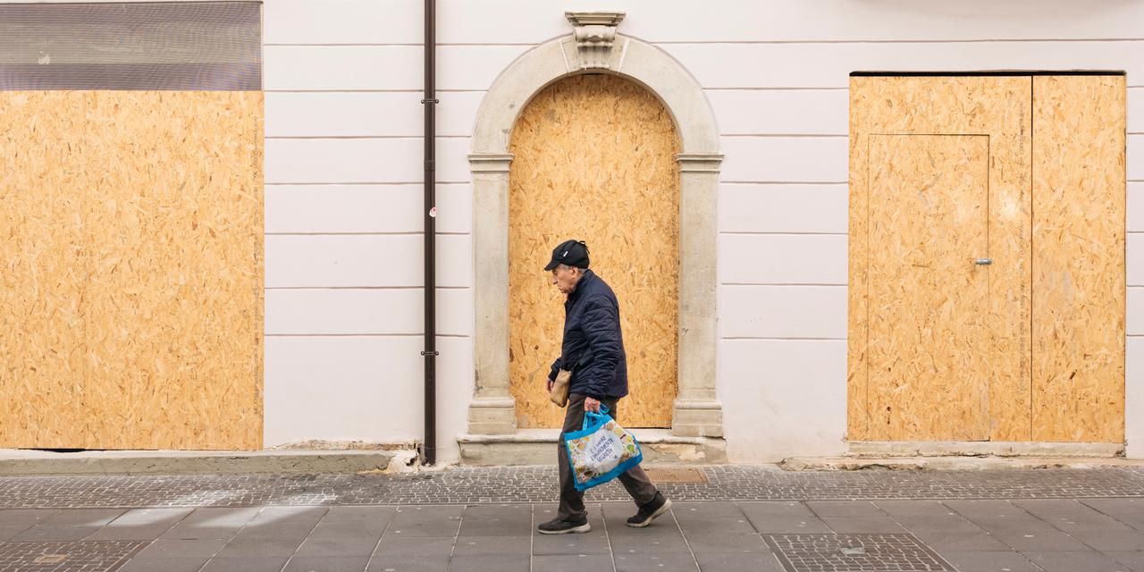 A shuttered storefront on Via Pretoria in Potenza