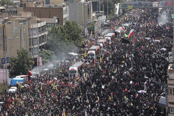 During the funeral procession of Iranian military commanders, scientists and other people killed during Israeli strikes in Tehran, June 28, 2025.