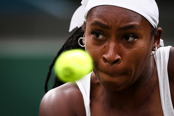 US player Coco Gauff eyes the ball as she returns it to Ukraine's Dayana Yastremska during their women's singles first round tennis match on the second day of the 2025 Wimbledon Championships at The All England Lawn Tennis and Croquet Club in Wimbledon, southwest London, on July 1, 2025.