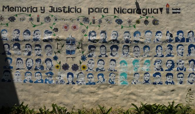 Une peinture représentant des Nicaraguayens tués lors des manifestations de 2018, titrée « Mémoire et justice pour le Nicaragua », sur un mur de l’organisation de défense des droits de l’homme Nicaragua Nunca mas, à San José, au Costa Rica, le lundi 20 février 2023.