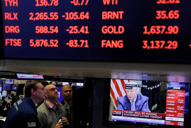 Les chiffres de la Bourse de New York (NYSE) lors d’une intervention de Donald Trump, à New York City, New York, Etats-Unis, le 11 mars 2020.