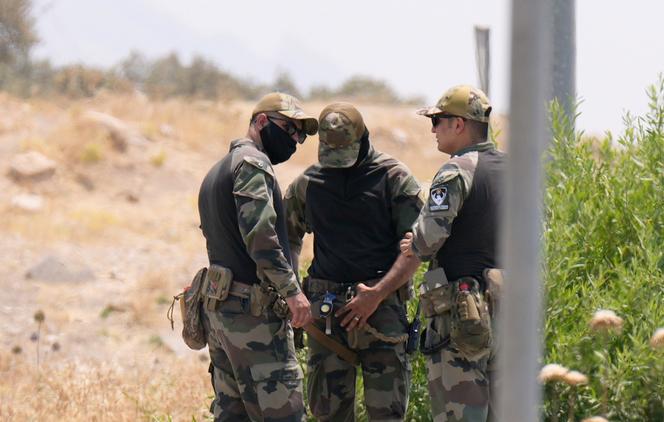 Des forces de l’ordre kurdes sécurisent le site de la grotte de Casene, où des combattants du PKK doivent déposer les armes, dans le gouvernorat de Souleimaniyé, dans le nord de l’Irak, le 11 juillet 2025.