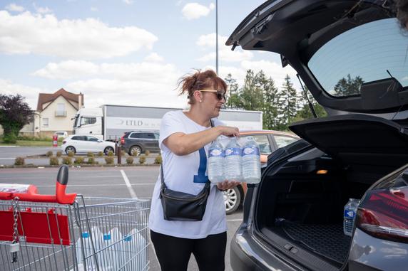 Séverine Bouvet in the parking lot of the Carrefour Market grocery store in Blagny, France, July 10, 2025.