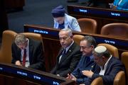Israeli PM Benjamin Netanyahu and members of his cabinet at the Israeli parliament in Jerusalem on July 14, 2025.