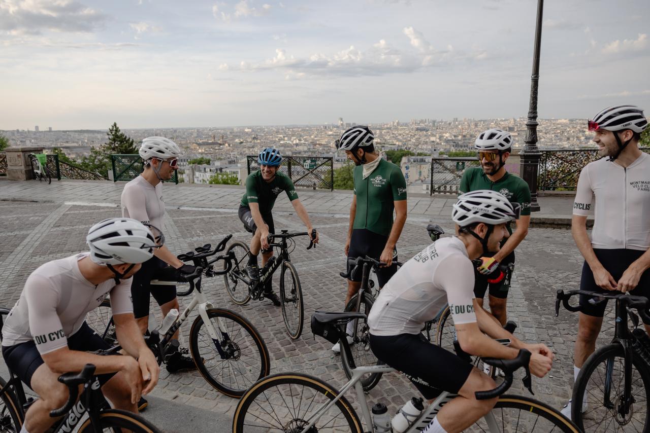 Members of the Montmartre Vélo Club in front of the Sacré-Cœur Basilica, Paris, July 19, 2025.