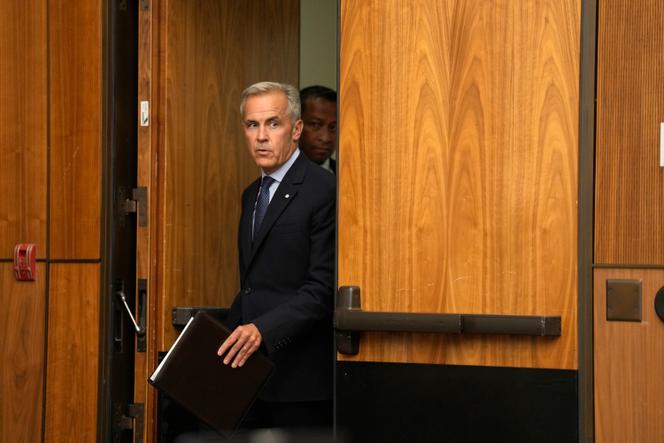 Le premier ministre canadien, Mark Carney, arrive à une conférence de presse pour une annonce sur la reconnaissance de l’Etat palestinien, à Ottawa, le 30 juillet 2025.