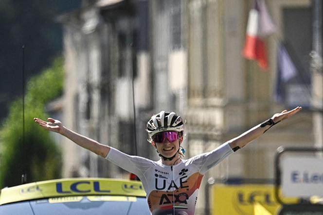 French rider Maëva Squiban celebrates as she crosses the finish line in Ambert, France, on July 31, 2025. 