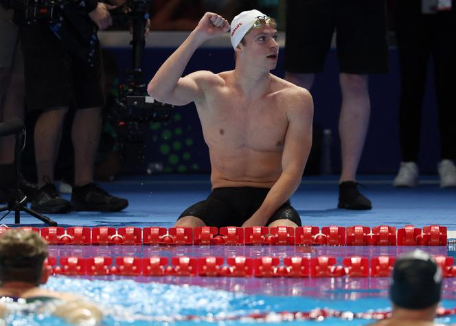 France's Léon Marchand celebrates after winning the men's 400m medley final. World Aquatics Championships Arena, Singapore, August 3, 2025.