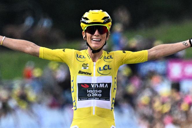 French rider Pauline Ferrand-Prévot celebrates as she crosses the finish line to win the 9th and final stage of the Women's Tour de France cycling race, 124.1 km from Praz-sur-Arly to Chatel, in eastern France, on August 3, 2025.