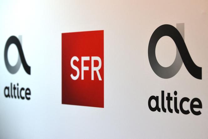 Les logos des groupes de télécommunications français Altice et SFR, en 11 avril 2019.