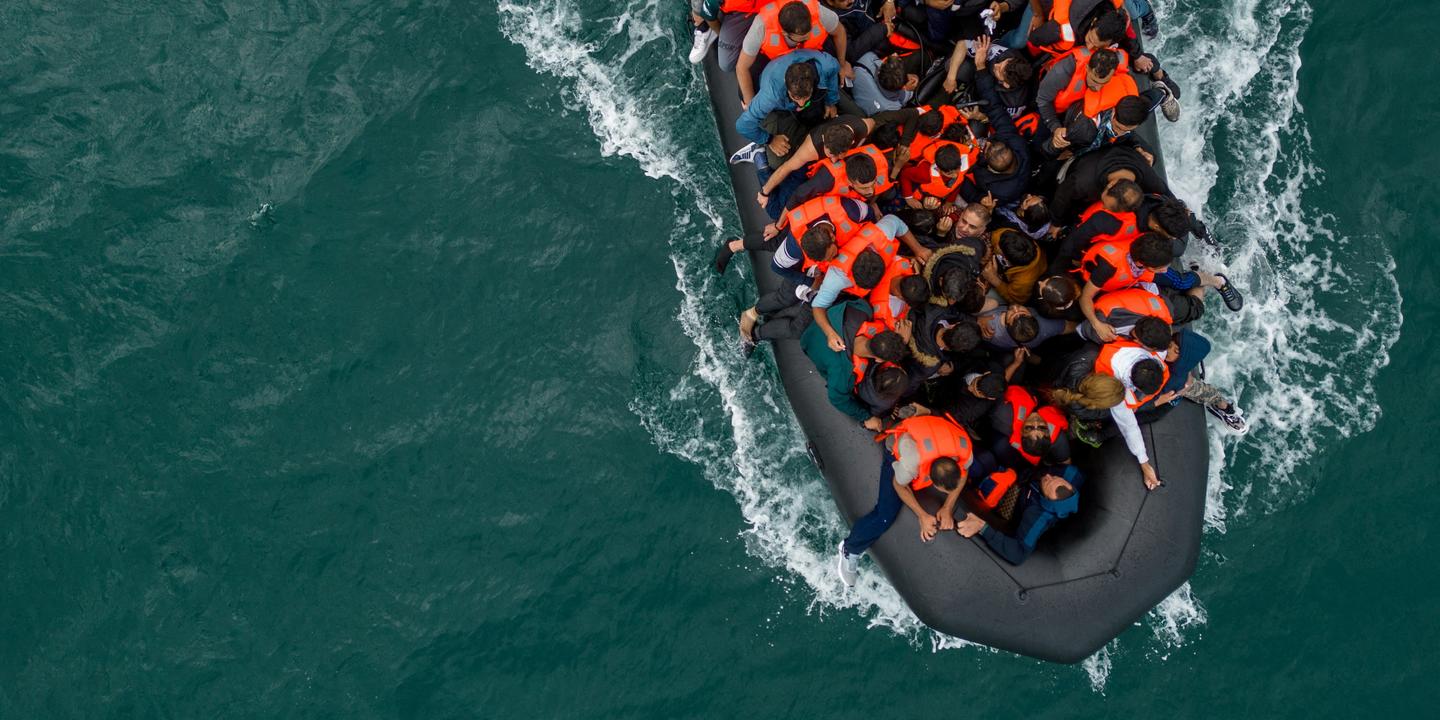 UK to start returning some migrants to France within days under new deal