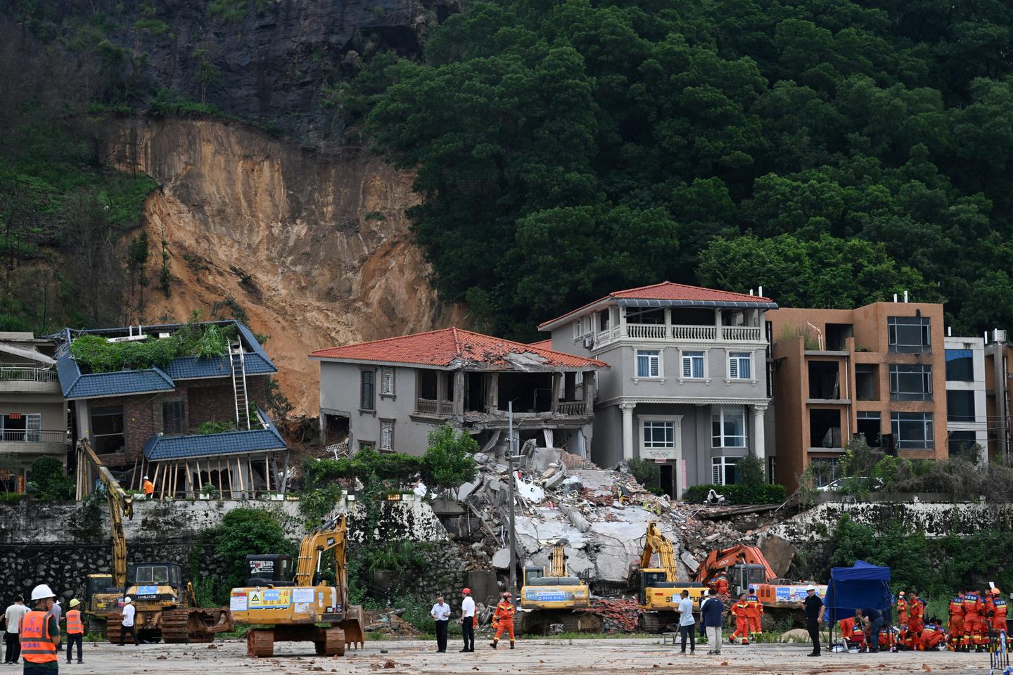 In southern China, tens of thousands evacuated after heavy rains, floods and landslides