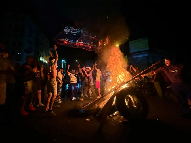 Manifestation contre le désarmement du Hezbollah soutenu par le gouvernement libanais, à Beyrouth, le 8 août 2025.