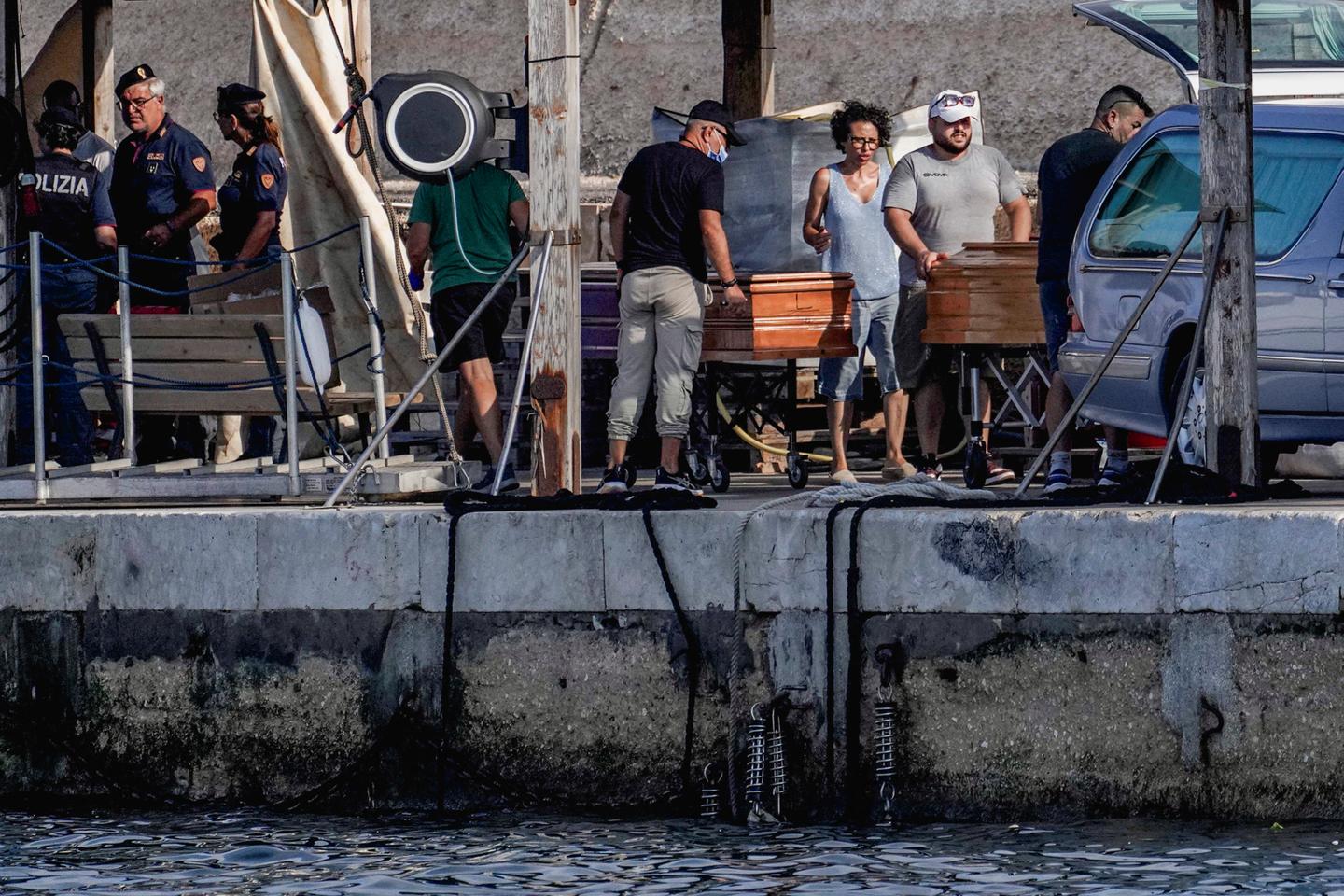 Italian authorities search for missing persons after deadly migrant shipwreck