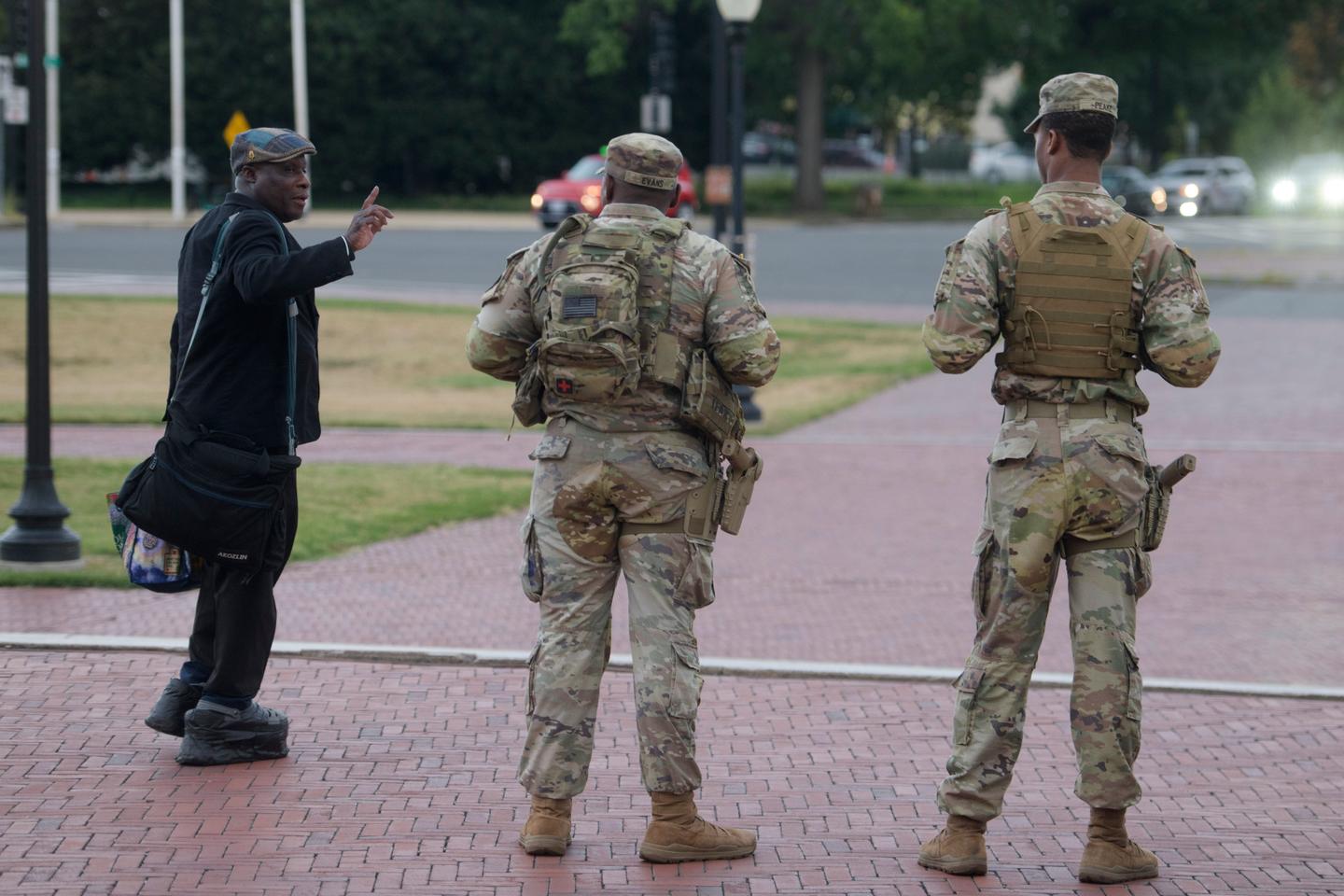 Some National Guard units in Washington, DC, now carry firearms, as Trump threatens more democratic cities