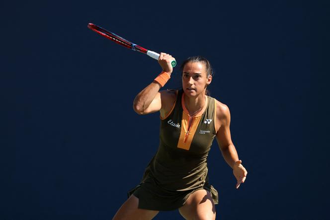 Caroline Garcia of France returns a shot against Kamilla Rakhimova, on August 25, 2025, in New York City.