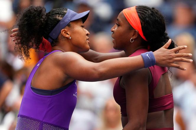 Naomi Osaka, left, of Japan, greets Coco Gauff, of the United States, after their match in the fourth round of the US Open tennis championships, on Monday, September 1, 2025, in Queens, New York. 
