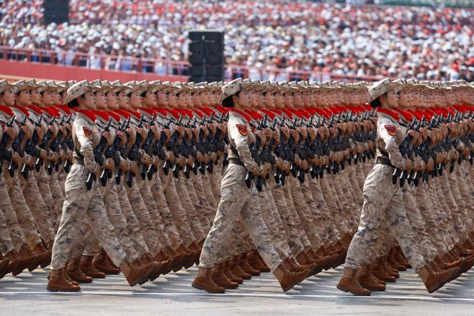 Des membres de la milice chinoise défilent lors du défilé militaire pour marquer le 80ᵉ anniversaire de la fin de la seconde guerre mondiale, à Pékin, le 3 septembre 2025.