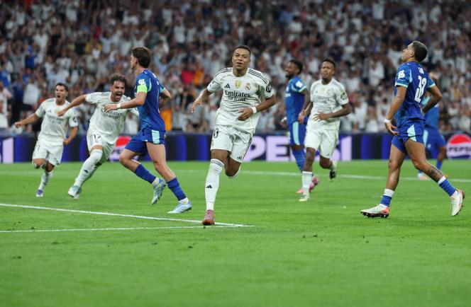 Kylian Mbappé célèbre son but inscrit lors du match de Ligue des champions entre le Real Madrid et l’Olympique de Marseille, au stade Santiago-Bernabeu, à Madrid, le 16 septembre 2025.