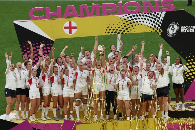 England lift the winners' trophy following the Women’s Rugby World Cup final between Canada and England at Twickenham, on September 27, 2025