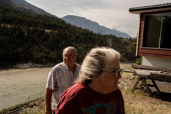 Shirley and Alan Dean in front of their house, one of the few that survived the fire, in Lytton, Canada, on June 11, 2025.