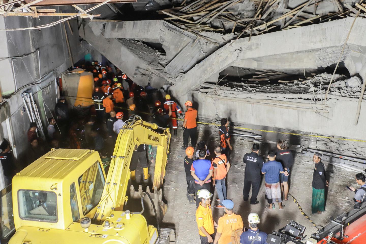 School building collapse in Indonesia leaves dozens missing and injured, with at least one student killed