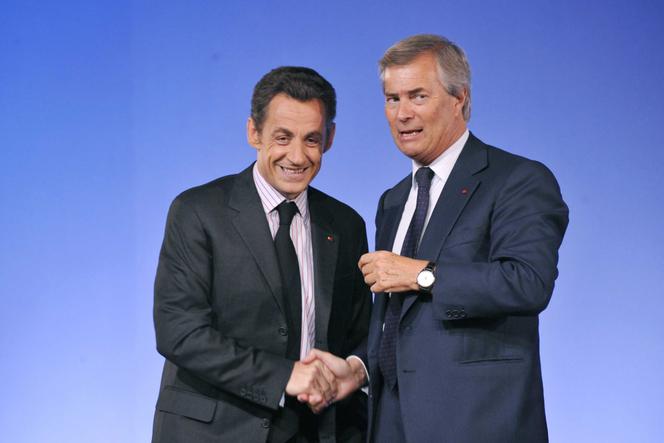 Nicolas Sarkozy et Vincent Bolloré, à Paris, le 19 mai 2008.